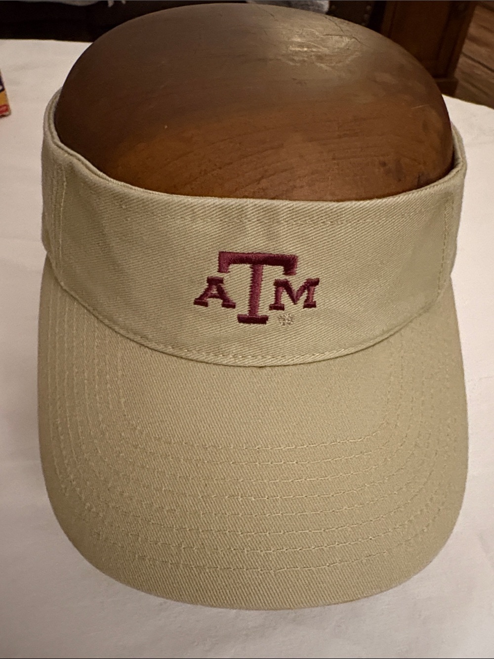 Texas A&M Beige Visor with Maroon Embroidered Logo. New.